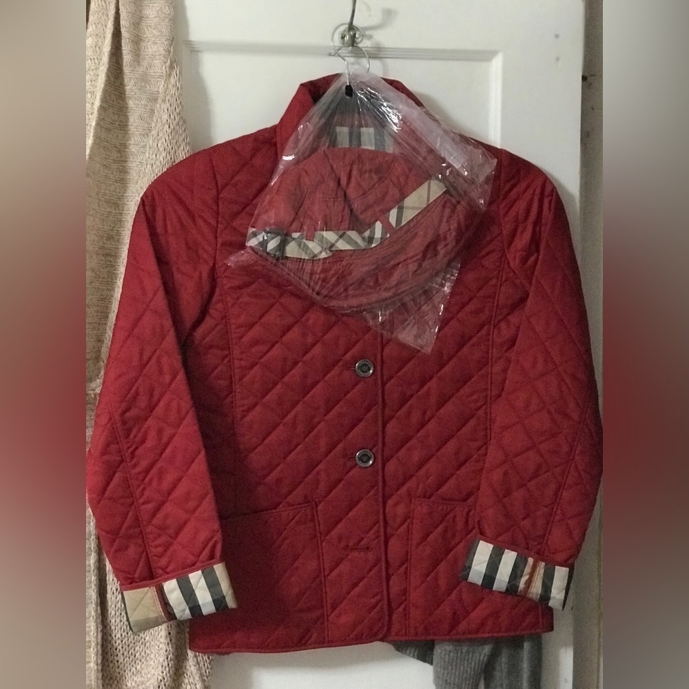 SOLD Authentic Burberry jacket.. Fit size 6.